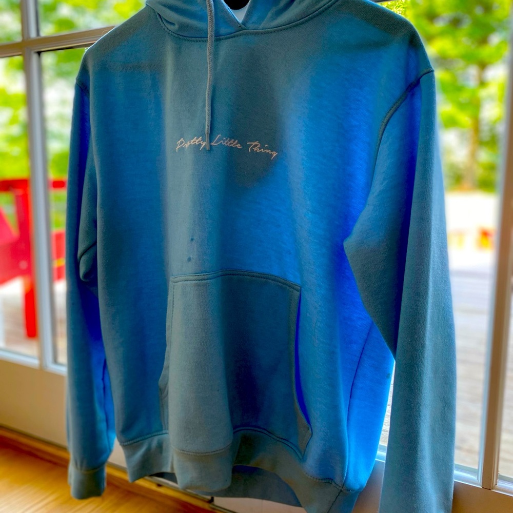 This is a blue hoodie from “pretty little things”